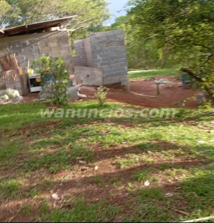13.000 US$ - se vende terreno en área rural con casa de dos cuartos y sala (chorrera el coco)
