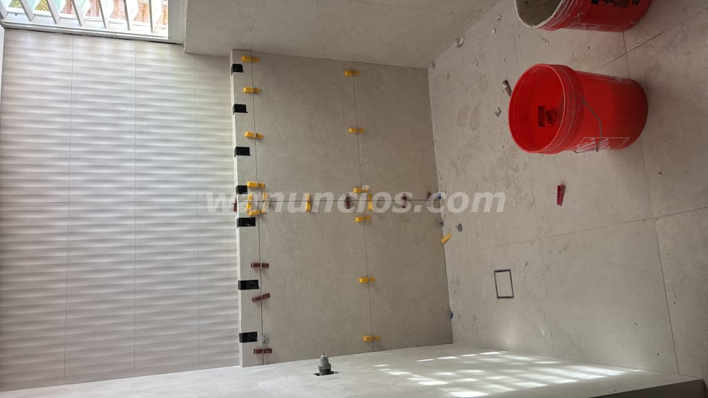 INSTALACIONES DE LOSAS MARMOL PIEDRA CORALINA Y MÁS (ARIA METRO) 4