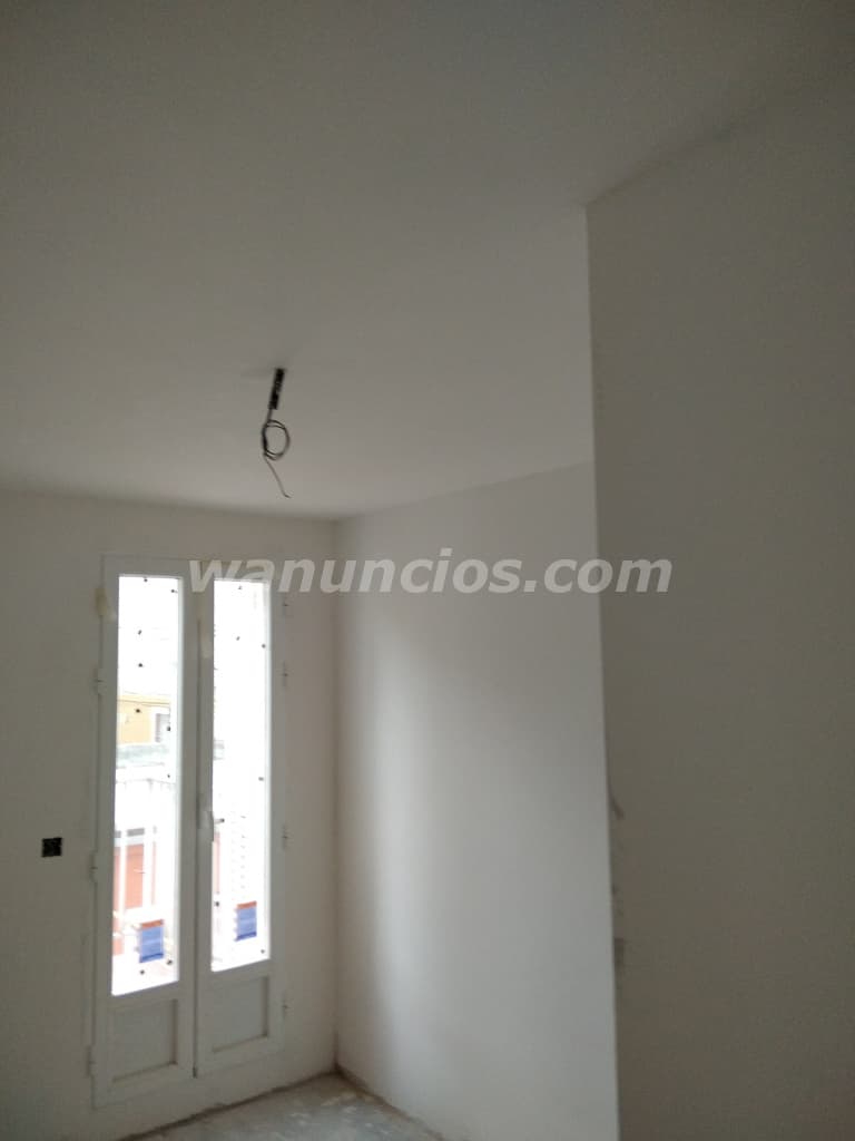 Yesero a mano alisados de aguaplast, enfoscados (Madrid) 2
