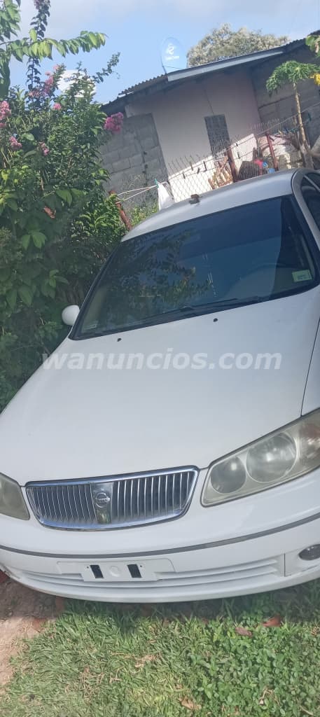 1 US$ - Se vende Nissan Almera 2004, Sedan Blanco (San Francisco, Las Garzas)