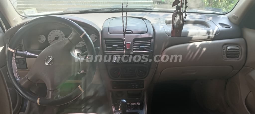 1 US$ - Se vende Nissan Almera 2004, Sedan Blanco (San Francisco, Las Garzas) 4