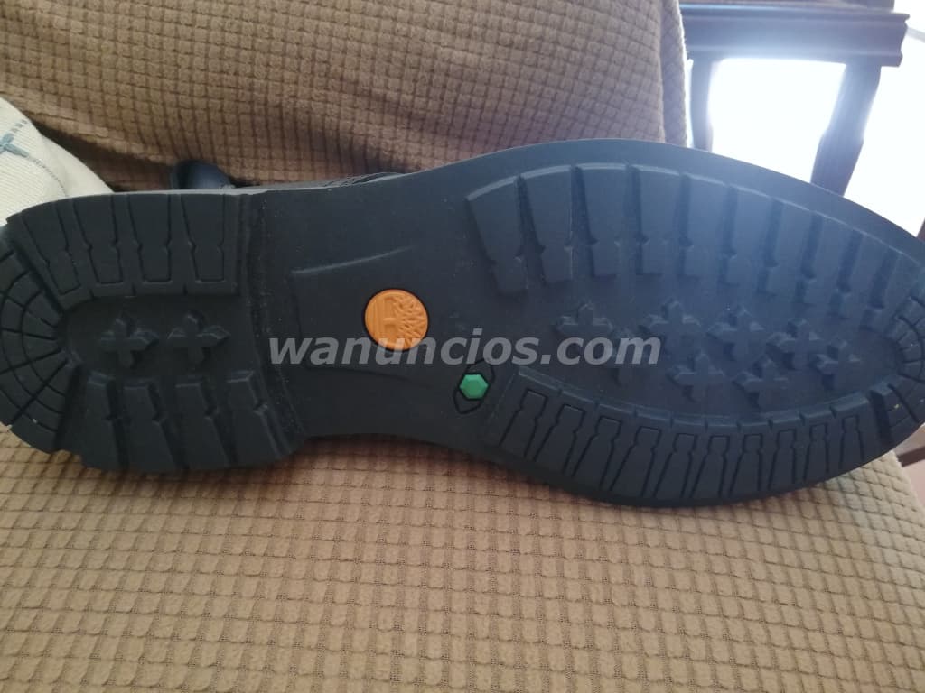 45 US$ - Se vende tennis converse color negro y un par de botas negras de piel 2